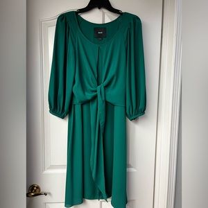 Belted green dress